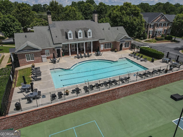 2630 Milford Ln, Alpharetta, GA 30009 - community pool featuring a patio area