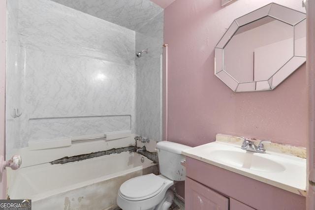bathroom featuring toilet, vanity, and shower / bathing tub combination