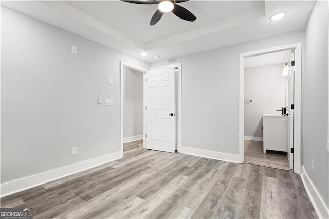 358 Roy St SW, Atlanta, GA 30310 - unfurnished bedroom with recessed lighting, baseboards, wood finished floors, a raised ceiling, and ceiling fan
