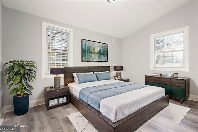 358 Roy St SW, Atlanta, GA 30310 - bedroom featuring vaulted ceiling, light wood-type flooring, and baseboards