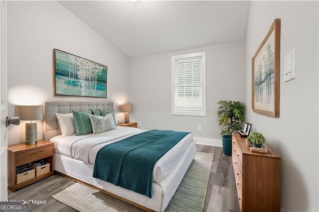 358 Roy St SW, Atlanta, GA 30310 - bedroom with lofted ceiling, wood finished floors, and baseboards