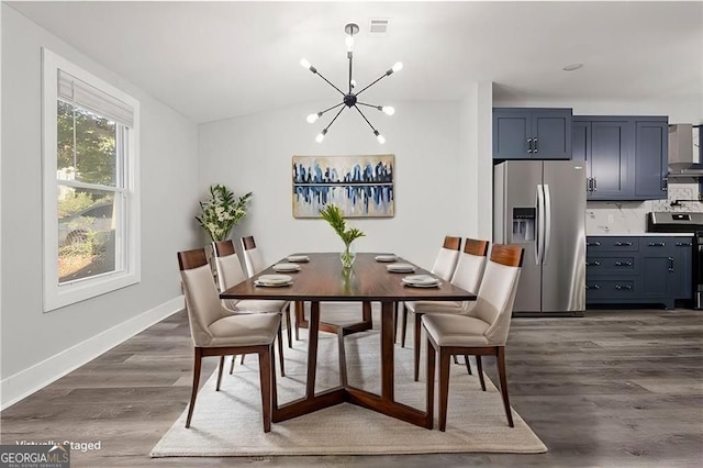 358 Roy St SW, Atlanta, GA 30310 - dining space with a chandelier, baseboards, and dark wood finished floors
