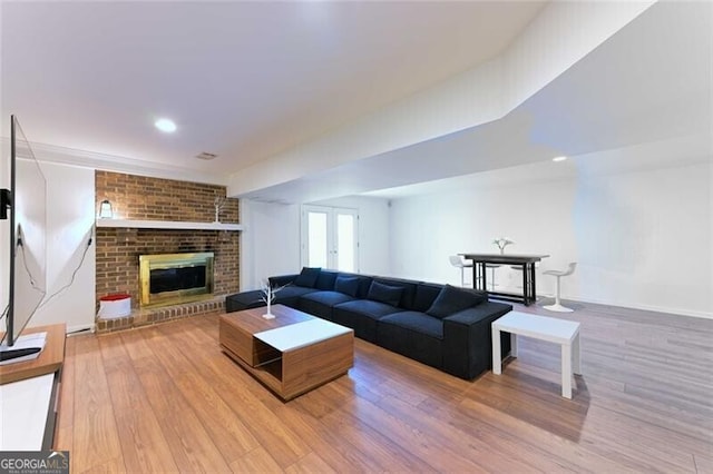 3811 Valley Green Dr, Marietta, GA 30068 - living area featuring wood finished floors, a fireplace, and baseboards