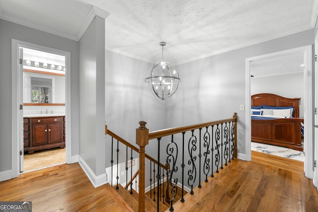 292 Old Rosser Rd, Stone Mountain, GA 30087 - stairway with baseboards, wood finished floors, and a notable chandelier