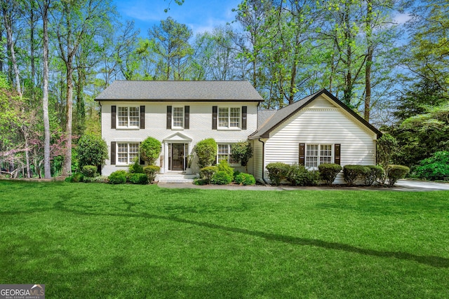 292 Old Rosser Rd, Stone Mountain, GA 30087 - colonial inspired home featuring a front lawn