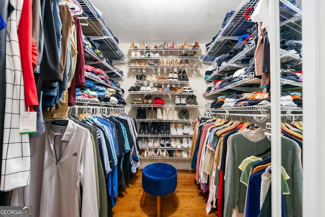 292 Old Rosser Rd, Stone Mountain, GA 30087 - spacious closet featuring wood finished floors