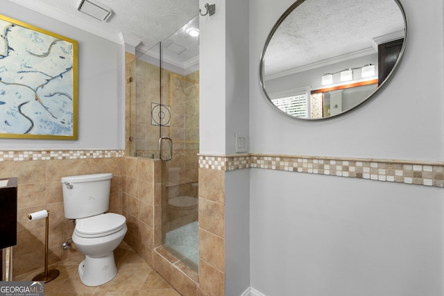 292 Old Rosser Rd, Stone Mountain, GA 30087 - full bath featuring crown molding, tile walls, a stall shower, and a textured ceiling