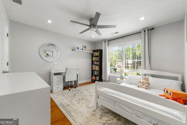 292 Old Rosser Rd, Stone Mountain, GA 30087 - bedroom featuring recessed lighting, wood finished floors, and visible vents