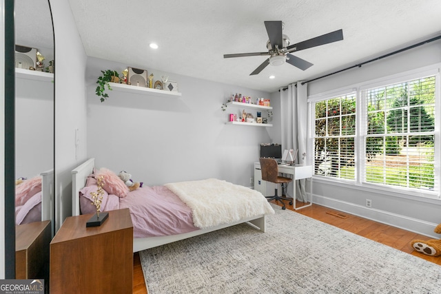 292 Old Rosser Rd, Stone Mountain, GA 30087 - bedroom featuring recessed lighting, baseboards, and wood finished floors