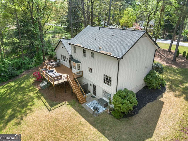 292 Old Rosser Rd, Stone Mountain, GA 30087 - back of house featuring stairs, a shingled roof, a yard, and a deck