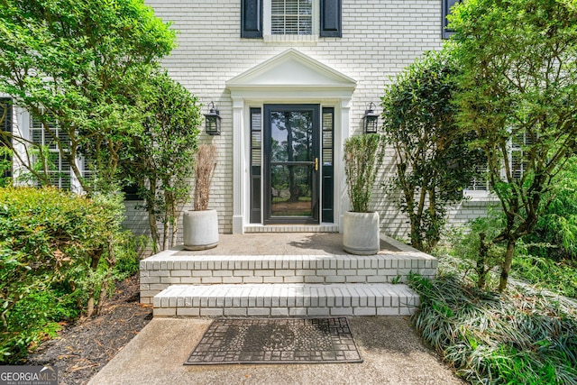 292 Old Rosser Rd, Stone Mountain, GA 30087 - view of exterior entry with brick siding
