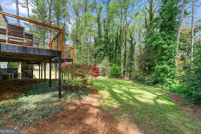 292 Old Rosser Rd, Stone Mountain, GA 30087 - view of yard featuring a wooden deck and stairway