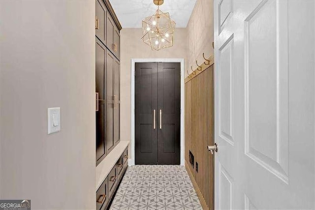 interior space with a notable chandelier