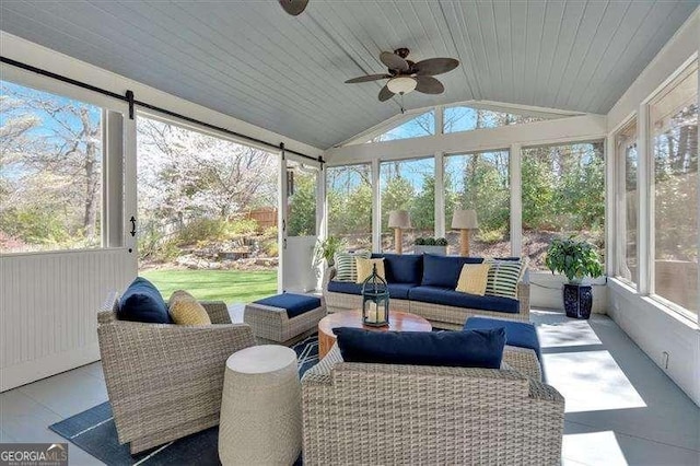 sunroom / solarium with outdoor lounge area and ceiling fan
