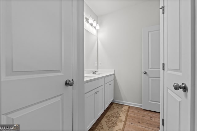 133 Bastian Rd, Mcdonough, GA 30252 - bathroom featuring vanity and wood finished floors