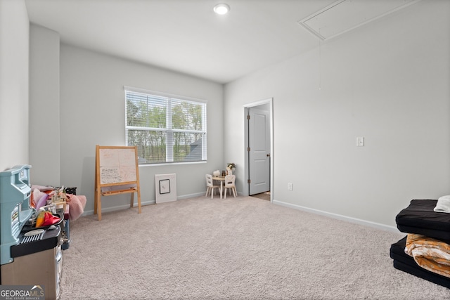133 Bastian Rd, Mcdonough, GA 30252 - living area with attic access and carpet flooring