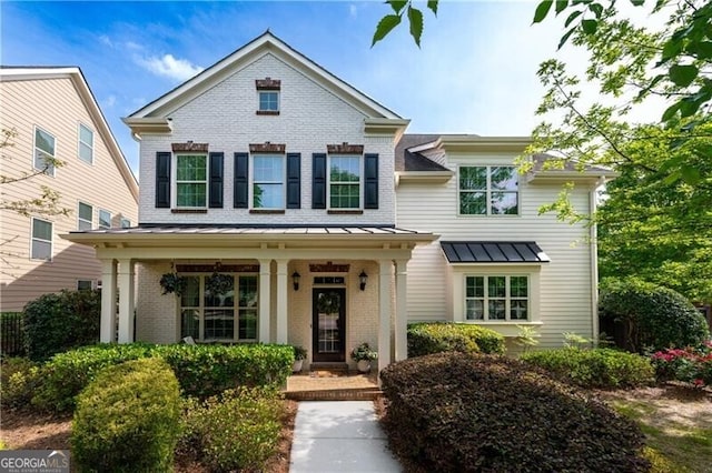 715 Saybeck Way, Milton, GA 30004 - view of front facade featuring brick siding, a standing seam roof, and covered porch