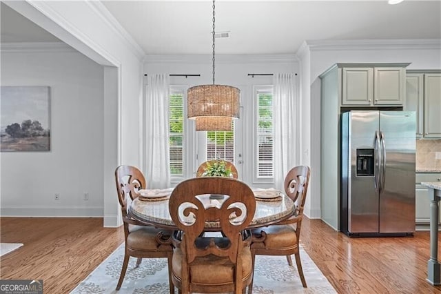 715 Saybeck Way, Milton, GA 30004 - dining room featuring light wood-type flooring, baseboards, and ornamental molding