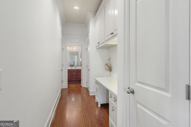 mudroom featuring recessed lighting, ornamental molding, baseboards, and dark wood-style floors