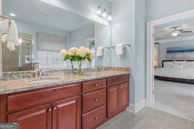 715 Saybeck Way, Milton, GA 30004 - bathroom featuring connected bathroom, double vanity, a shower stall, tile patterned floors, and ceiling fan