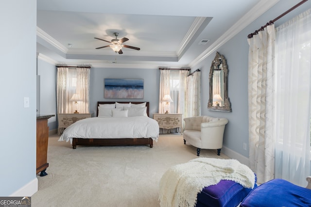 bedroom featuring carpet floors, ornamental molding, visible vents, baseboards, and ceiling fan