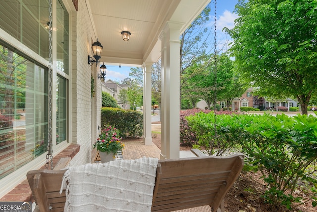 view of patio featuring a porch