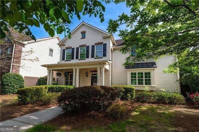 715 Saybeck Way, Milton, GA 30004 - traditional-style home with brick siding, a standing seam roof, and covered porch
