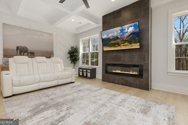 4980 Wildeoak Trl, Douglasville, GA 30135 - living room with beamed ceiling, baseboards, a fireplace, wood finished floors, and coffered ceiling