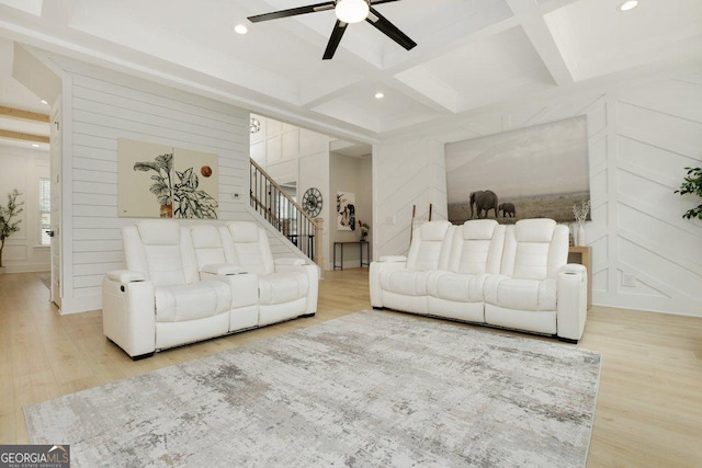 4980 Wildeoak Trl, Douglasville, GA 30135 - living room with a decorative wall, a ceiling fan, stairway, and wood finished floors