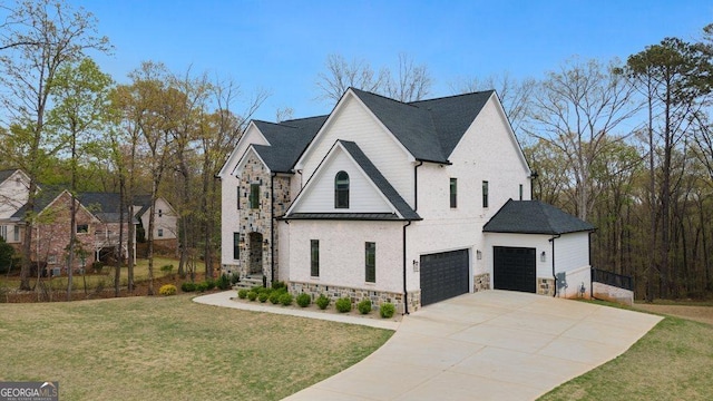 4980 Wildeoak Trl, Douglasville, GA 30135 - view of side of home featuring driveway, stone siding, a lawn, and a standing seam roof