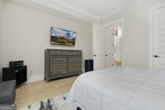 4980 Wildeoak Trl, Douglasville, GA 30135 - bedroom with wood finished floors, crown molding, baseboards, and visible vents