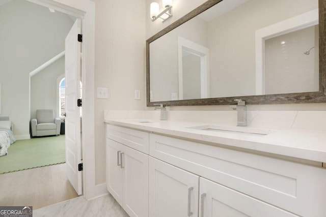 4980 Wildeoak Trl, Douglasville, GA 30135 - ensuite bathroom with ensuite bathroom, double vanity, a sink, and marble finish floor