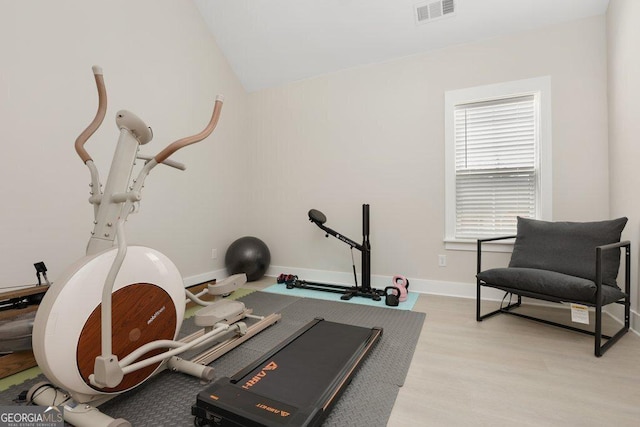 4980 Wildeoak Trl, Douglasville, GA 30135 - workout area with baseboards, visible vents, light wood-style floors, and lofted ceiling
