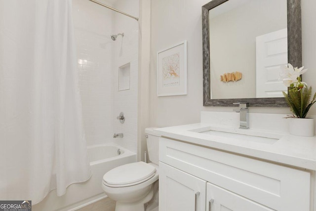 4980 Wildeoak Trl, Douglasville, GA 30135 - bathroom featuring toilet, shower / bath combination with curtain, and vanity