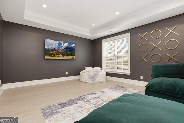4980 Wildeoak Trl, Douglasville, GA 30135 - sitting room featuring a raised ceiling, recessed lighting, baseboards, and wood finished floors