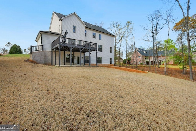4980 Wildeoak Trl, Douglasville, GA 30135 - back of house featuring a lawn and a wooden deck