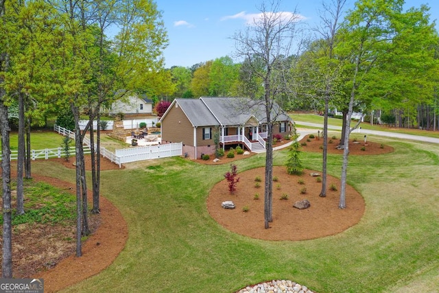 155 Duncans Mill Dr, Locust Grove, GA 30248 - view of front of property featuring a front lawn and fence