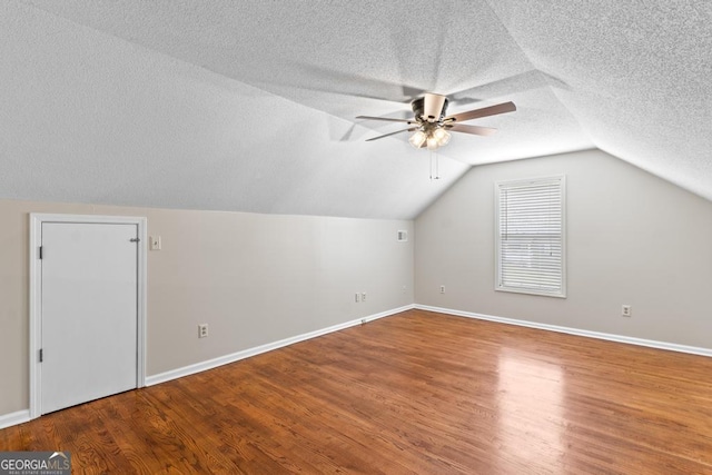 155 Duncans Mill Dr, Locust Grove, GA 30248 - additional living space featuring baseboards, a textured ceiling, wood finished floors, and a ceiling fan