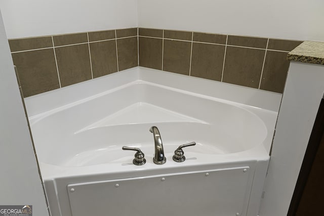 full bathroom featuring a tub