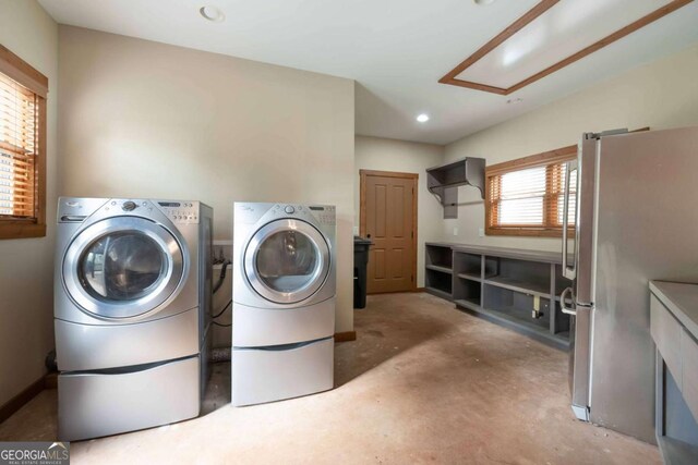 142 Holland Dam Dr, Maysville, GA 30558 - laundry area with washing machine and clothes dryer and laundry area