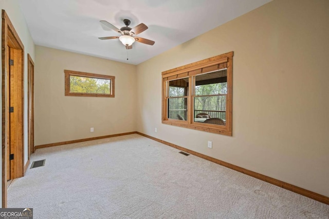 142 Holland Dam Dr, Maysville, GA 30558 - unfurnished bedroom with light carpet, baseboards, and visible vents