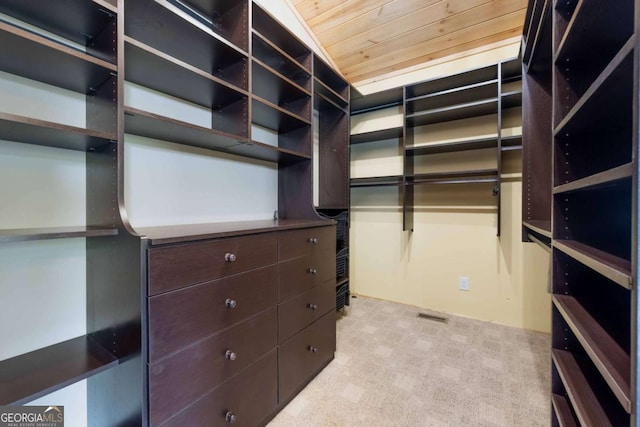 142 Holland Dam Dr, Maysville, GA 30558 - walk in closet featuring visible vents and carpet