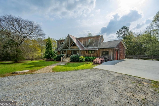 142 Holland Dam Dr, Maysville, GA 30558 - view of front of property featuring fence, a front lawn, and gravel driveway
