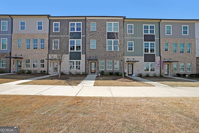 3323 Owl Creek Pkwy, Acworth, GA 30102 - townhome / multi-family property with board and batten siding