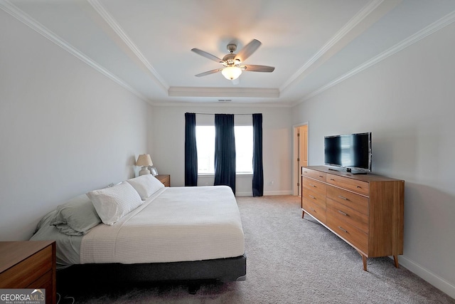 3323 Owl Creek Pkwy, Acworth, GA 30102 - bedroom featuring a raised ceiling, light colored carpet, crown molding, baseboards, and ceiling fan