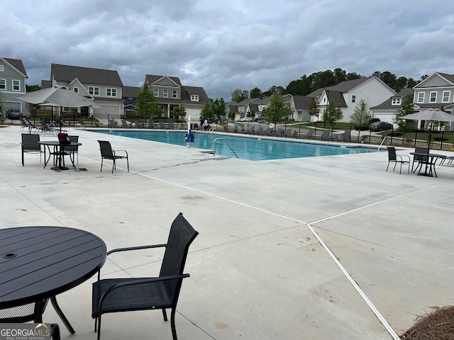 3323 Owl Creek Pkwy, Acworth, GA 30102 - community pool featuring fence, a residential view, and a patio area