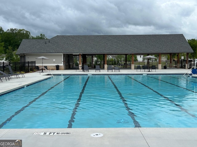 3323 Owl Creek Pkwy, Acworth, GA 30102 - community pool with fence and a patio area