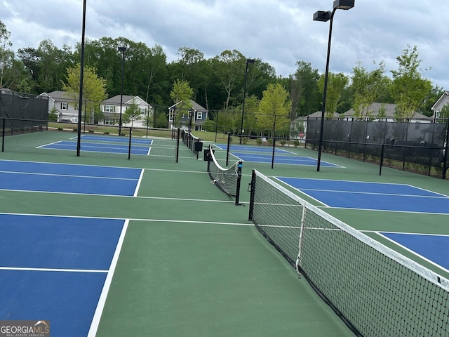 3323 Owl Creek Pkwy, Acworth, GA 30102 - view of tennis court with community basketball court and fence