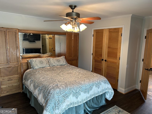 6121 N Main St SE, Acworth, GA 30101 - bedroom with a closet, a ceiling fan, crown molding, and dark wood-style floors