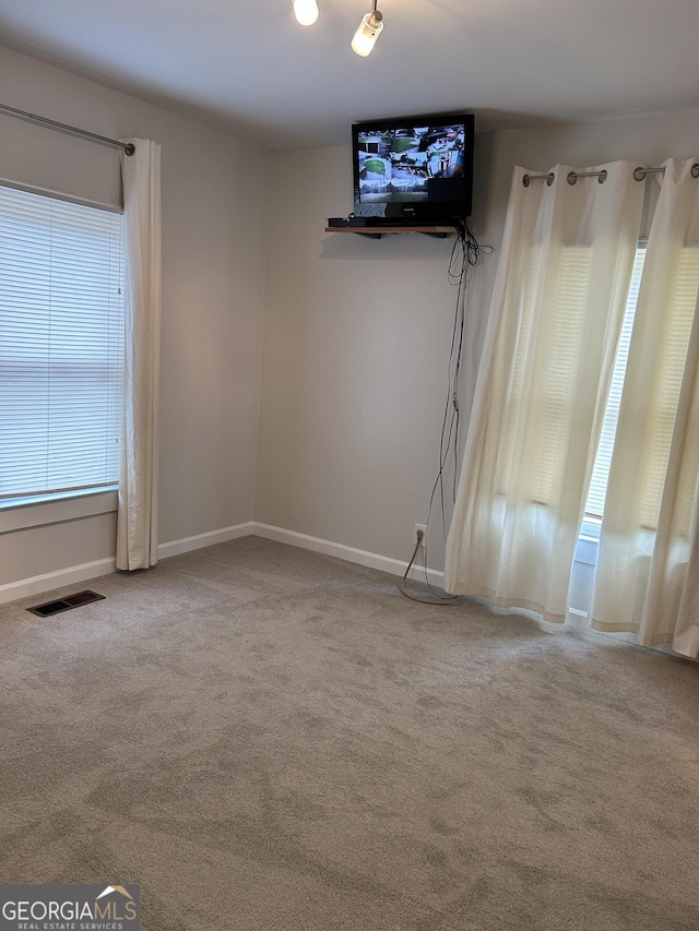 6121 N Main St SE, Acworth, GA 30101 - interior space with visible vents, carpet flooring, and baseboards
